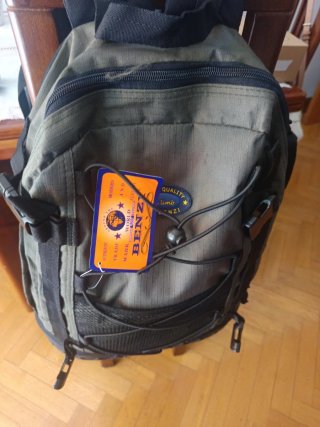 Mochila verde con cordones y malla