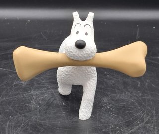 Divertida figura de Milú con un gran Hueso