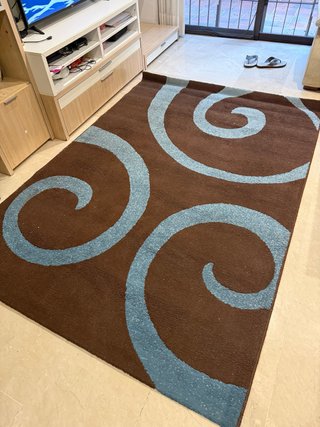 Alfombra moderna espiral marrón y azul