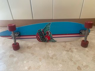 Se vende monopatin largo en byen estado