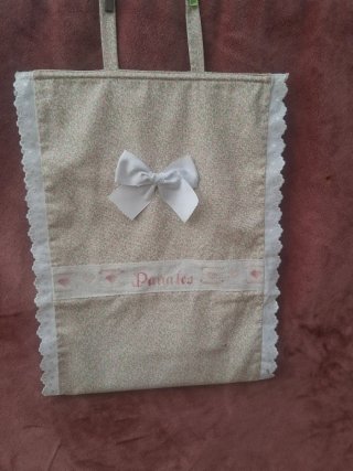 Cuelga pañales con nombre personalizado
