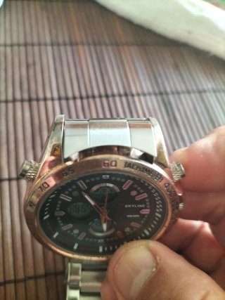 Reloj SKYLINE Oro y Plata