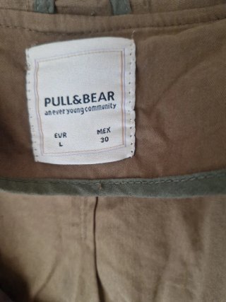 Parka verde con bordados