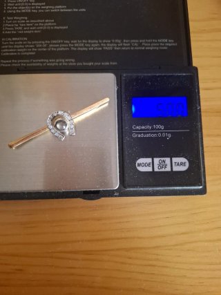 Pisacorbatas Oro 18k con diamantes
