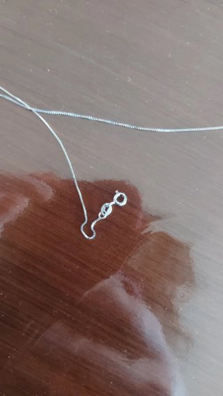 Collana con ciondolo a tre cerchi