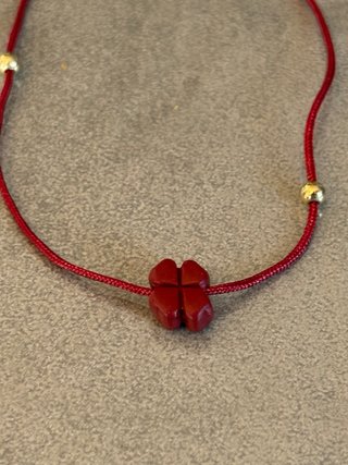 Braccialetto cinabro quadrifoglio oro