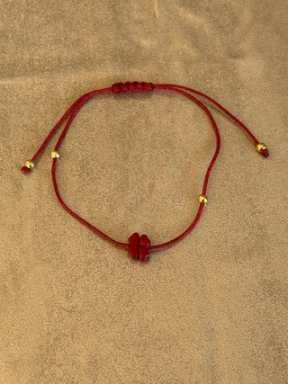 Braccialetto cinabro quadrifoglio oro