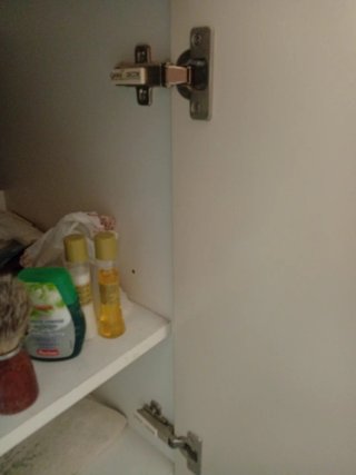 Lavabo de mármol y mueble porcelana beige