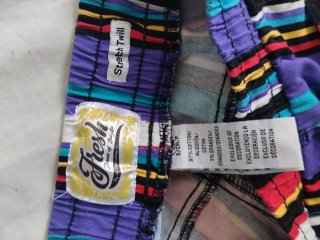 Pantalón corto rayas multicolor