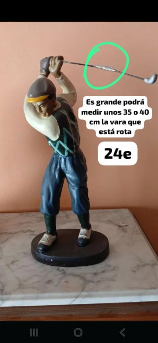 Figura de golfista rota