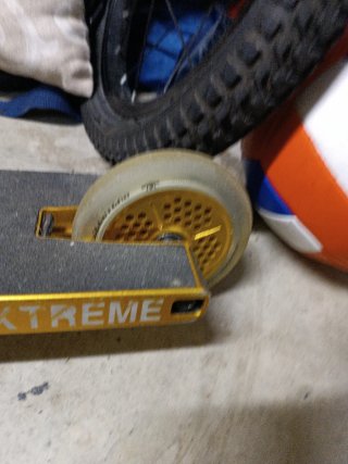 Patinete NKD Dorado