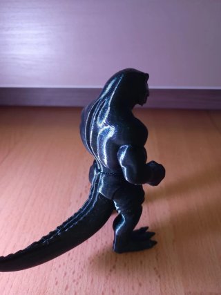 Figura dinosaurio musculoso impreso en 3D