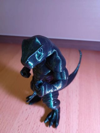 Figura dinosaurio musculoso impreso en 3D