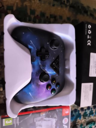 Lote Nintendo Switch Azul/Rojo con juegos y mando