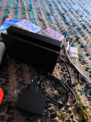 Lote Nintendo Switch Azul/Rojo con juegos y mando