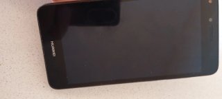 Teléfono Huawei Negro y Dorado