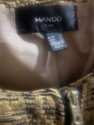 Chaqueta Mango dorada con cremallera