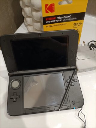 Nintendo 3DS XL 64 GB juegos gris