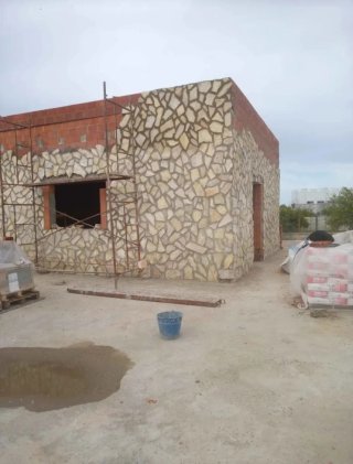 Albañilería oficial