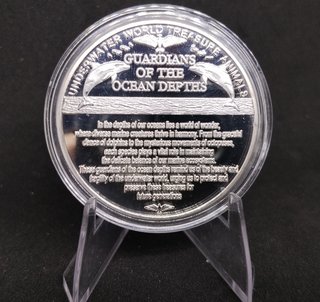 MONEDA CONMEMORATIVA BAÑADA EN PLATA DELFÍN