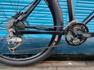 Bici B'TWIN MTB RockShox + Deore + Maxxis