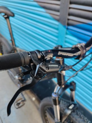 Bici B'TWIN MTB RockShox + Deore + Maxxis
