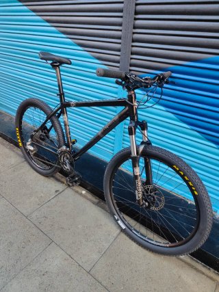 Bici B'TWIN MTB RockShox + Deore + Maxxis