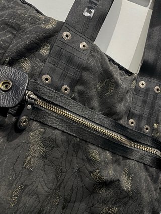 Borsa Diesel nera con dettagli oro