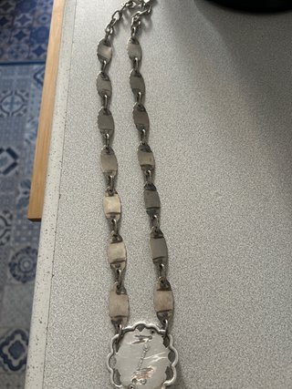 Colgante de bisutería plateado