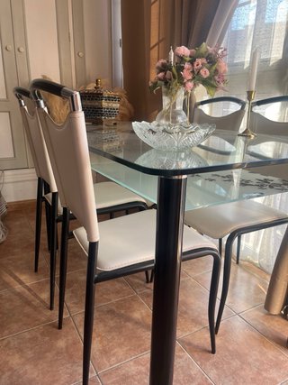 Mesa cristal y 6 sillas polipiel