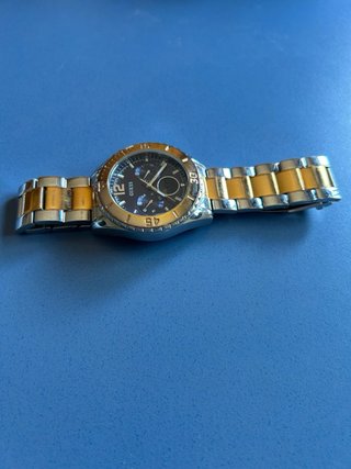 Reloj Guess bicolor dorado y plateado