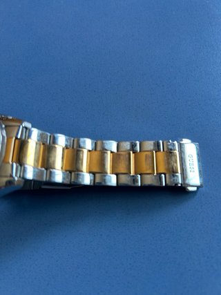 Reloj Guess bicolor dorado y plateado