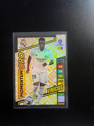 Vinicius Momentum Oro - Cromos Fútbol