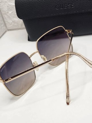 Gafas de sol Guess doradas y plateadas