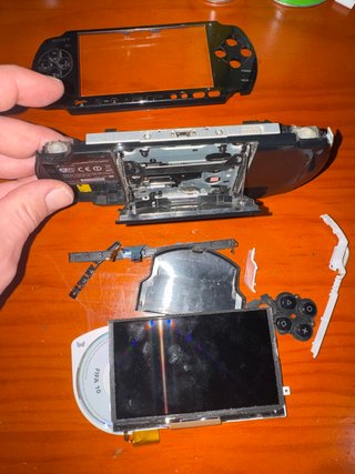 PSP 3004 piezas y juego FIFA 10