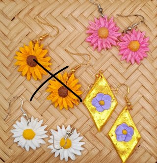 Pendientes hechos a mano. Rayos. Flores. Nuevos