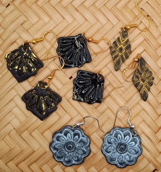 Pendientes hechos a mano. Rayos. Flores. Nuevos