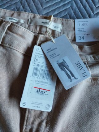 Pantalón flare beige Mango mujer