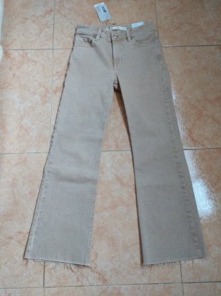Pantalón flare beige Mango mujer