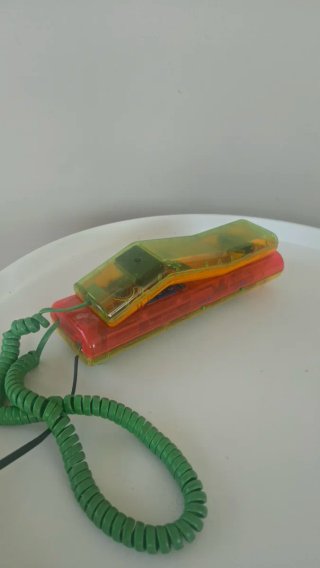 Teléfono Swatch Transparente Rojo y Verde