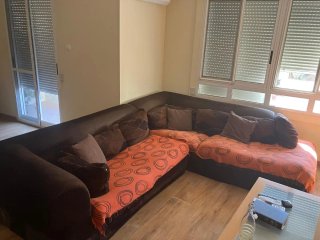 Sofá chaise longue marrón y naranja