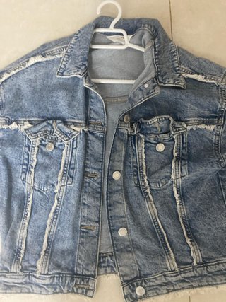 Chaqueta tejana desgastada