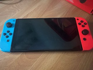 Nintendo Switch OLED Azul/rojo + accesorios