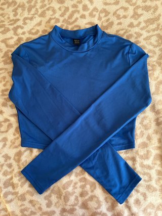 Top azul eléctrico manga larga
