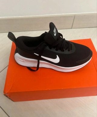 Zapatillas Nike Promina Negras y Blancas