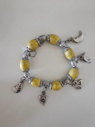 Lote de pulseras y expositor