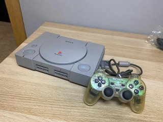 Sony PlayStation PS1 Gris con Mando transparente