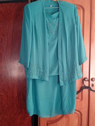 Conjunto vestido y chaqueta morado