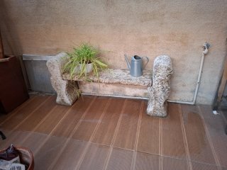 Banco de piedra para jardín