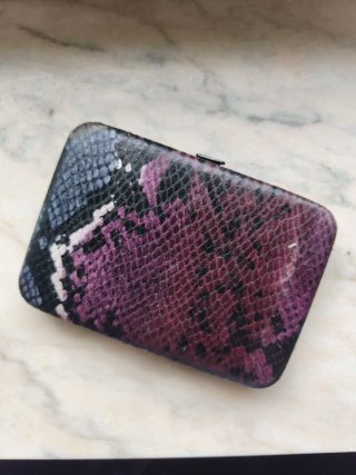 Cartera Stradivarius efecto piel serpiente